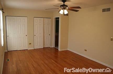 Master Bedroom
						:
						This master bedroom has wood floors, a ceiling fan and a private bathroom.