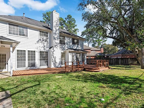 Large back yard with huge deck