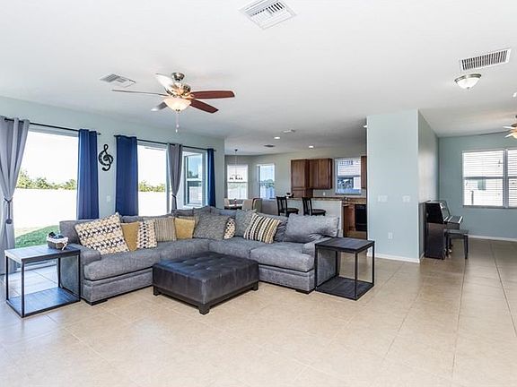 Family room open to kitchen and eating area