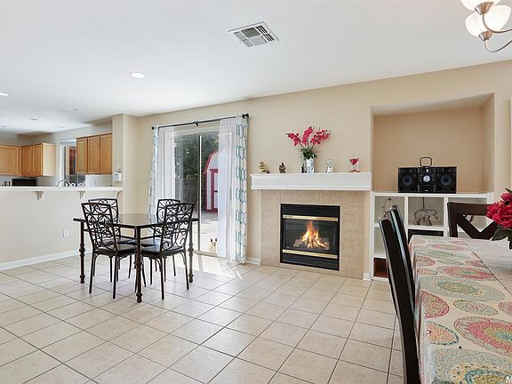 Family room / dining room combo with Fireplace.