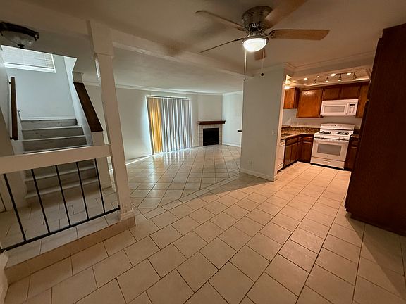 Main living area and kitchen with dining area