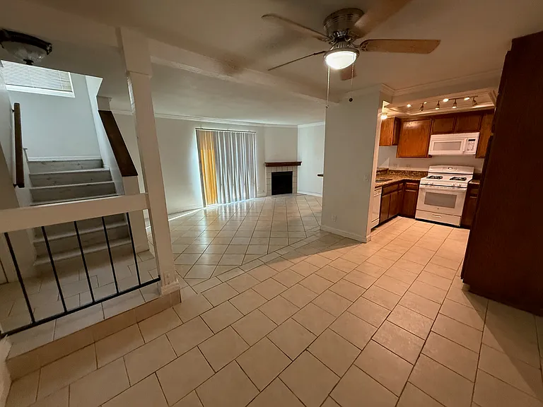 Main living area and kitchen with dining area