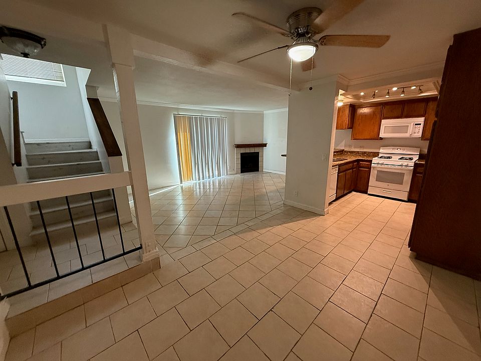 Main living area and kitchen with dining area