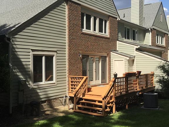 Deck. New Andersen doors and windows on the back of the unit