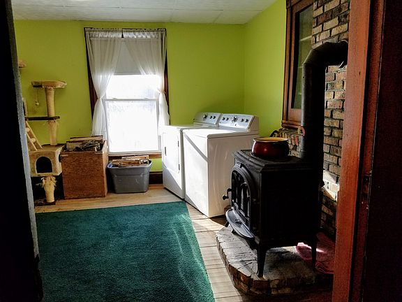 Den with hearth/woodstove