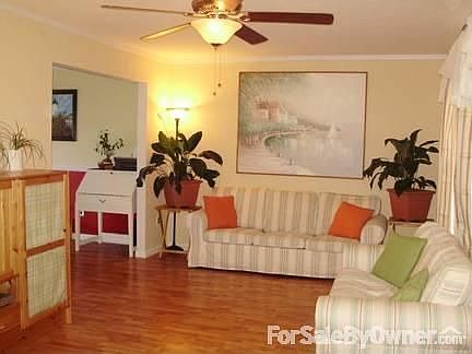 Living Room
						:
						Pergo thru/out, new windows thru/out, crown molding, remote control ceiling fan