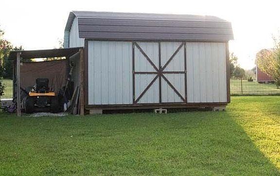 Large shed and lean-to. 