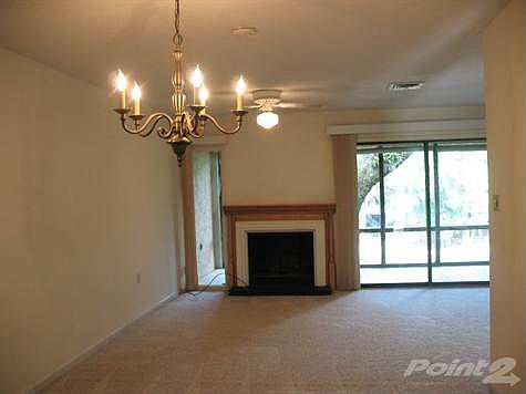 Living Room - Dining Combo w/ Fireplace
