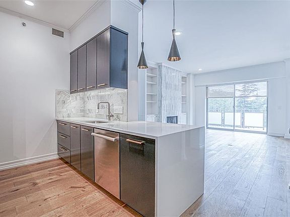 5th image of 4950 Central St APT 205