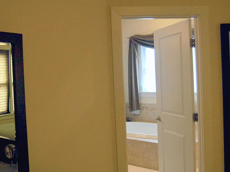 Primary Bedroom into Master Bathroom