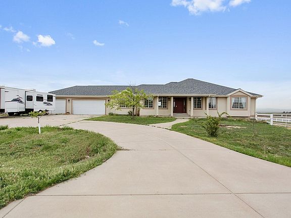 3 car garage with RV parking