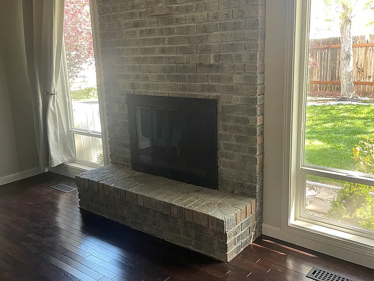 Wood-burning fireplace in Living Room