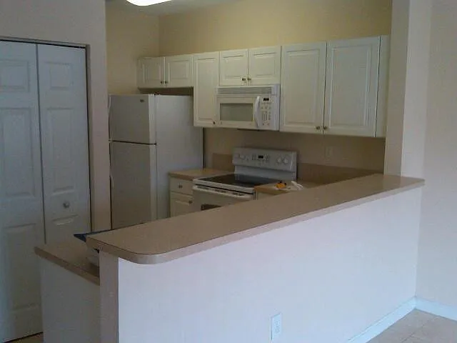 1650 NE 33rd Rd #108 — Photo 2