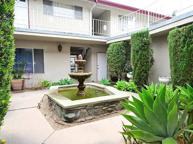 view of courtyard and fish pond
