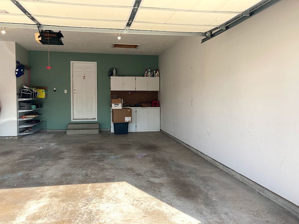 Spacious garage with plenty of storage space.