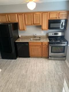 Updated Kitchen with ALL New Refrigerator, Gas Range/Stove and over the Range Micro-wave.

Updated Granite Countertop; Wood Cabinetry, Dishwasher and Tile Flooring!