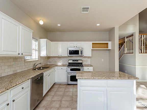 Lots of counter space and cabinetry for you to enjoy.