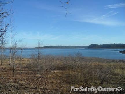 Smooth beach access!
						:
						Few lakefront lots left on Eden Isle! This one has the best access to a beach!