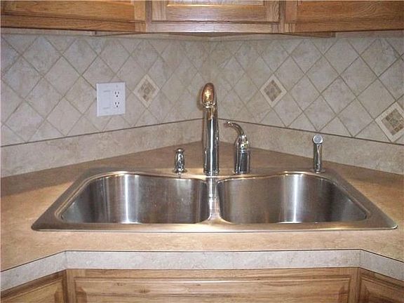 Double Sink with Attractive Tile Backsplash