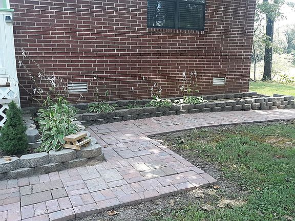 New paver walkway and hosta bed