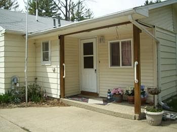 Covered porch on the side.