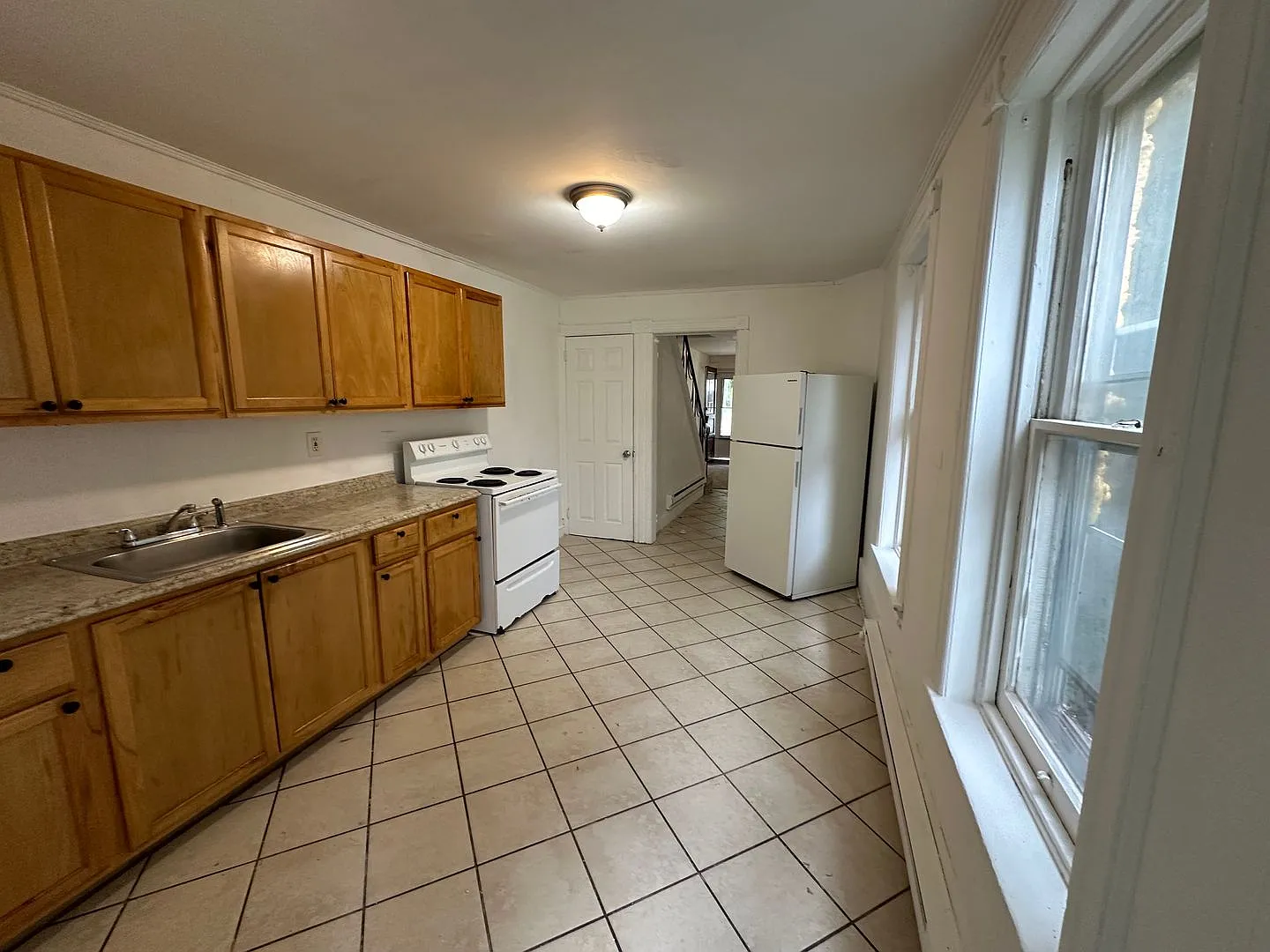 Renovated 4-Bedroom Home with Private Backyard Section 8 Applicants Accepted — Photo 3