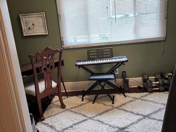 Sunroom Looking Out On Street * Brings In Additional Natural Light