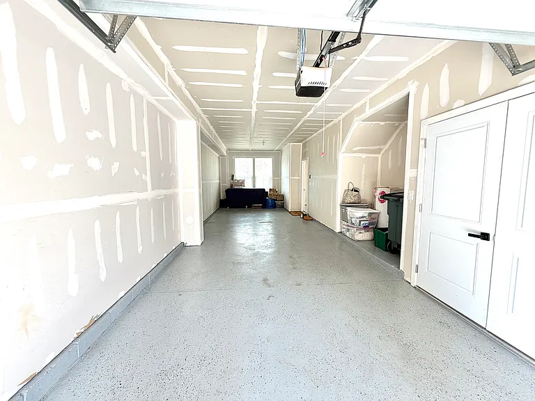 2 car tandem garage with open and closet storage