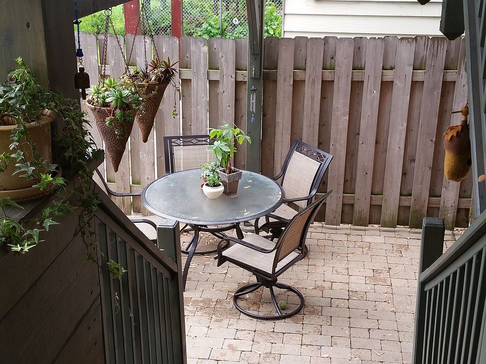 Cut patio with pavers and planting boxes