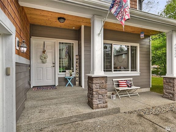 Love the country style front porch!  Beautiful cedar ceilings 