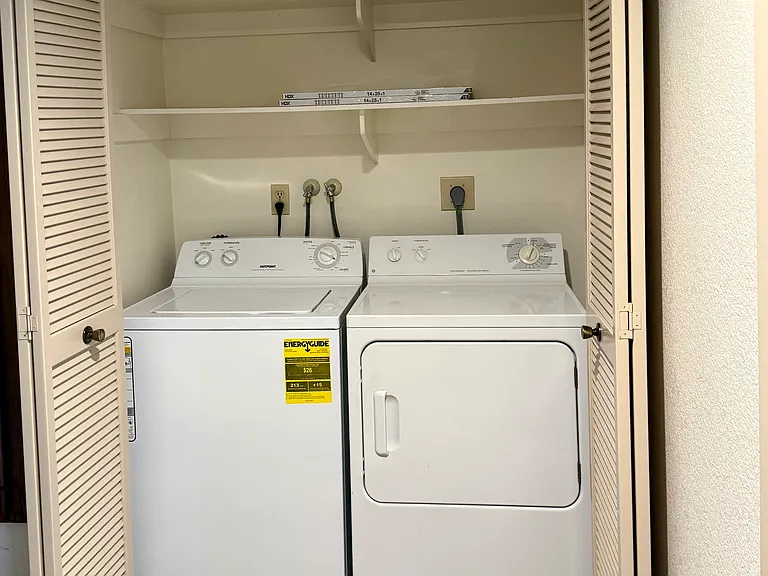 Washer & dryer in unit, upstairs near both bedrooms.