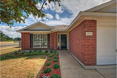 Greet your guests from this lovely landscaped entry.