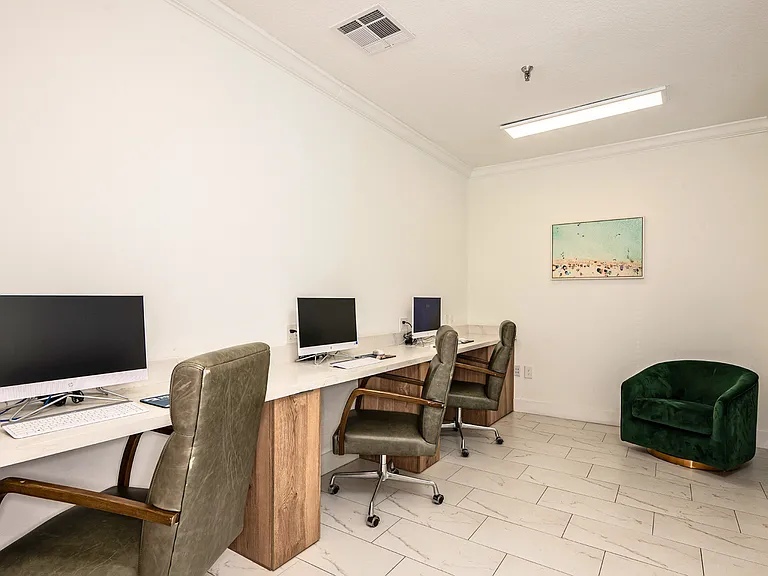 Cyber co-working lounge with dedicated workstations