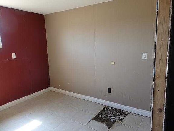 Bedroom with hole in floor
