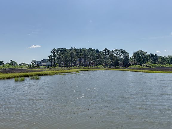 VIEWS FROM WATER TO HOUSE