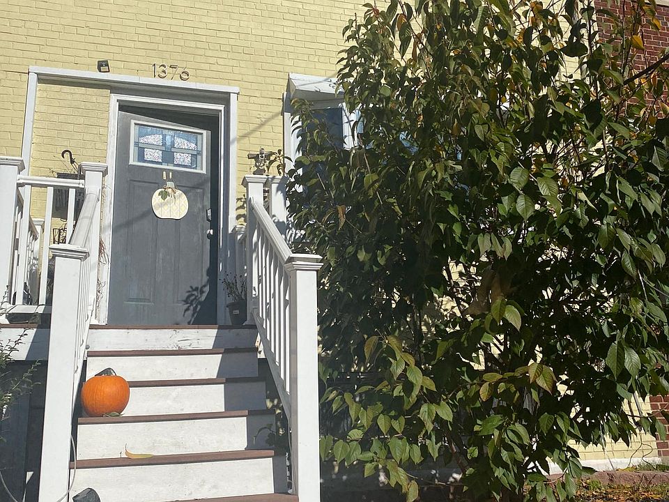 Front of home. Note steps up from the street level- added security. Located on a one way street