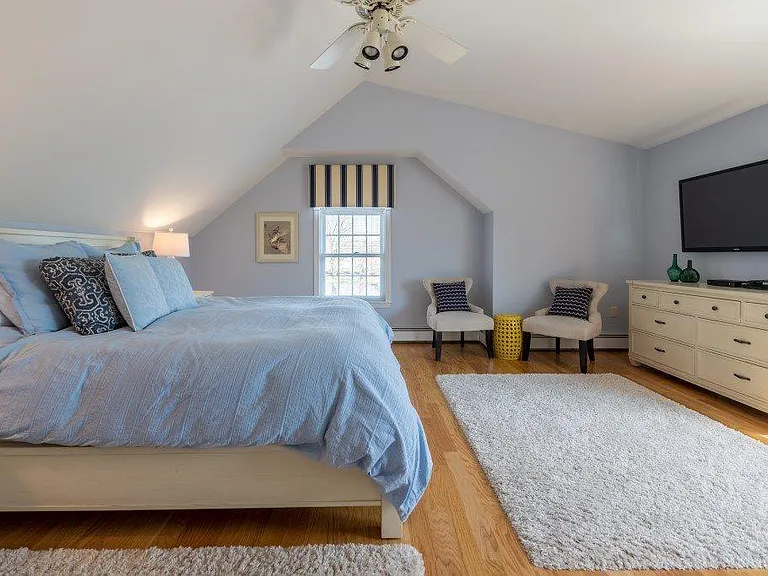 Flat screen TV in master bedroom