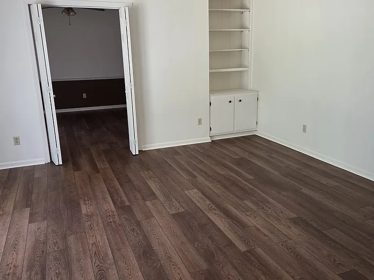 Front Room with built-in bookshelf.