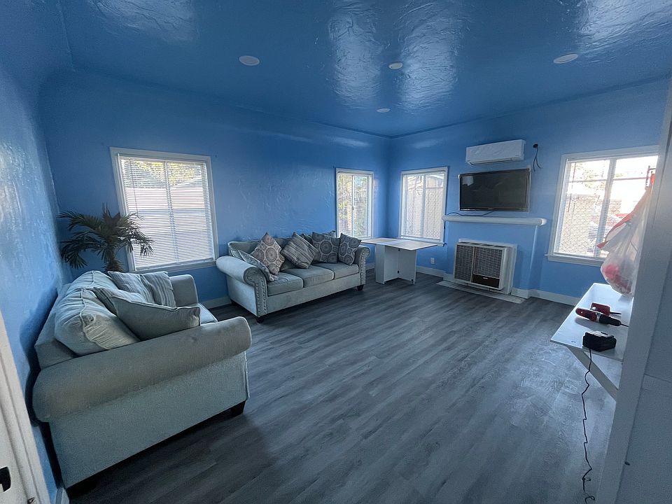Versatile, private room which converts from Living Room to Dining area and Bedroom. Private room locks off from main building hallway and shared dorm Kitchen & Bath.