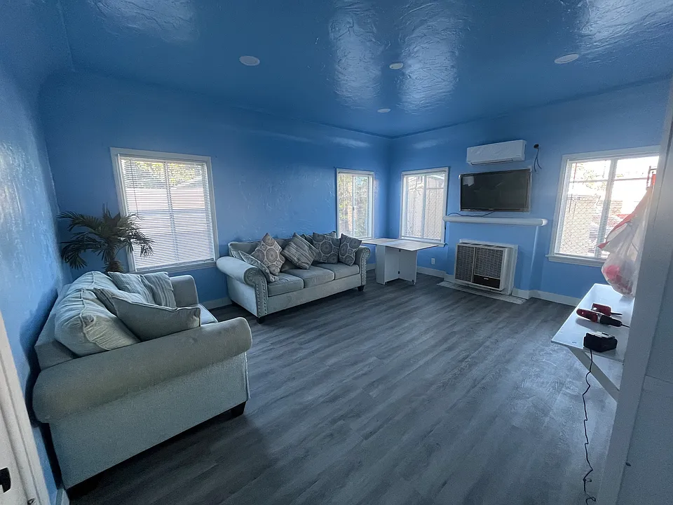 Versatile, private room which converts from Living Room to Dining area and Bedroom. Private room locks off from main building hallway and shared dorm Kitchen & Bath.