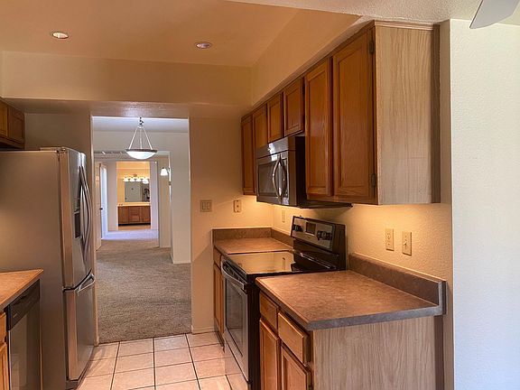 4th image of 9550 N 94th Pl Unit 207