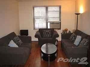 Huge Living Room with Hardwood Floors