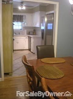 Dining flows into kitchen
						:
						Double oven in kitchen. All appliances stay except refrigerator.
