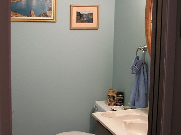 MASTER BEDROOM FEATURES 1/2 BATH AND WALKIN CLOSET