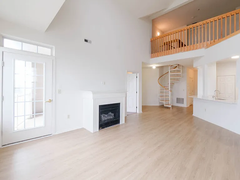 Living Room with Fireplace and Hard Surface Flooring