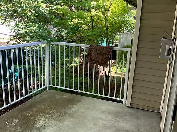 Covered Balcony surrounded by greenery