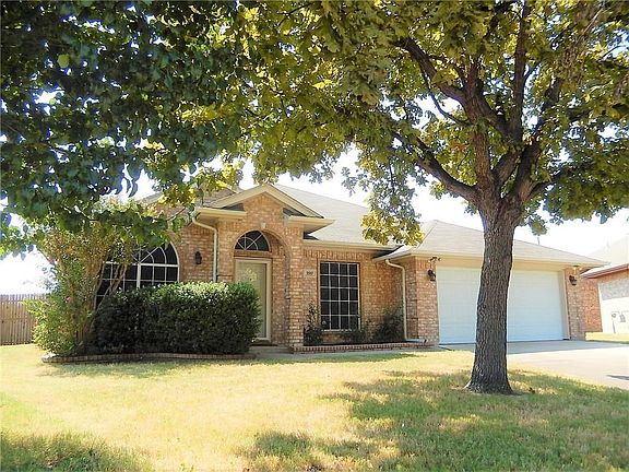 Beautiful home with mature trees