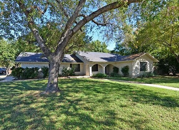 This lovely home has lots to offer, inside and out. Inside there are newer lights and fixtures throughout. Outside there are lovely large trees surrounding this home. The windows and roof were replaced in 2011. The Trane A/C was replaced in 2014.
