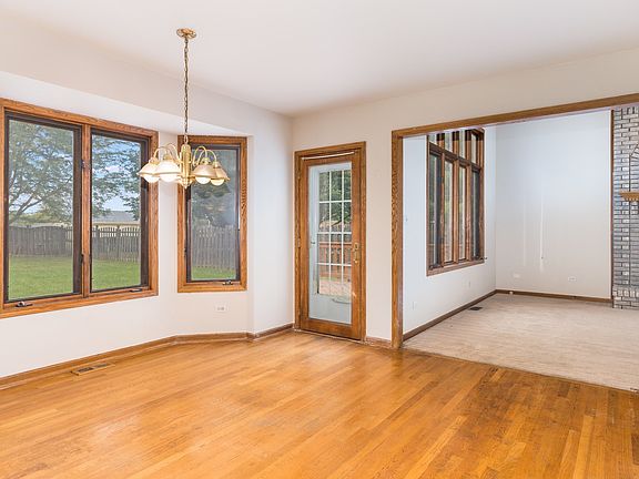 Dinette with Bay Window Overlooking Deck and Fenced Back Yard!