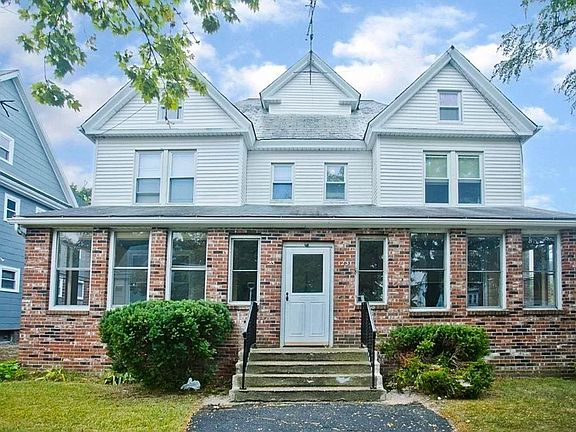 Three-season enclosed front porch